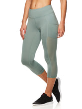 Load image into Gallery viewer, Reebok Women's Focus Capri Leggings
