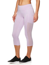 Load image into Gallery viewer, Reebok Women's Focus Capri Leggings
