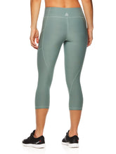 Load image into Gallery viewer, Reebok Women's Quick Capri Seamed Leggings
